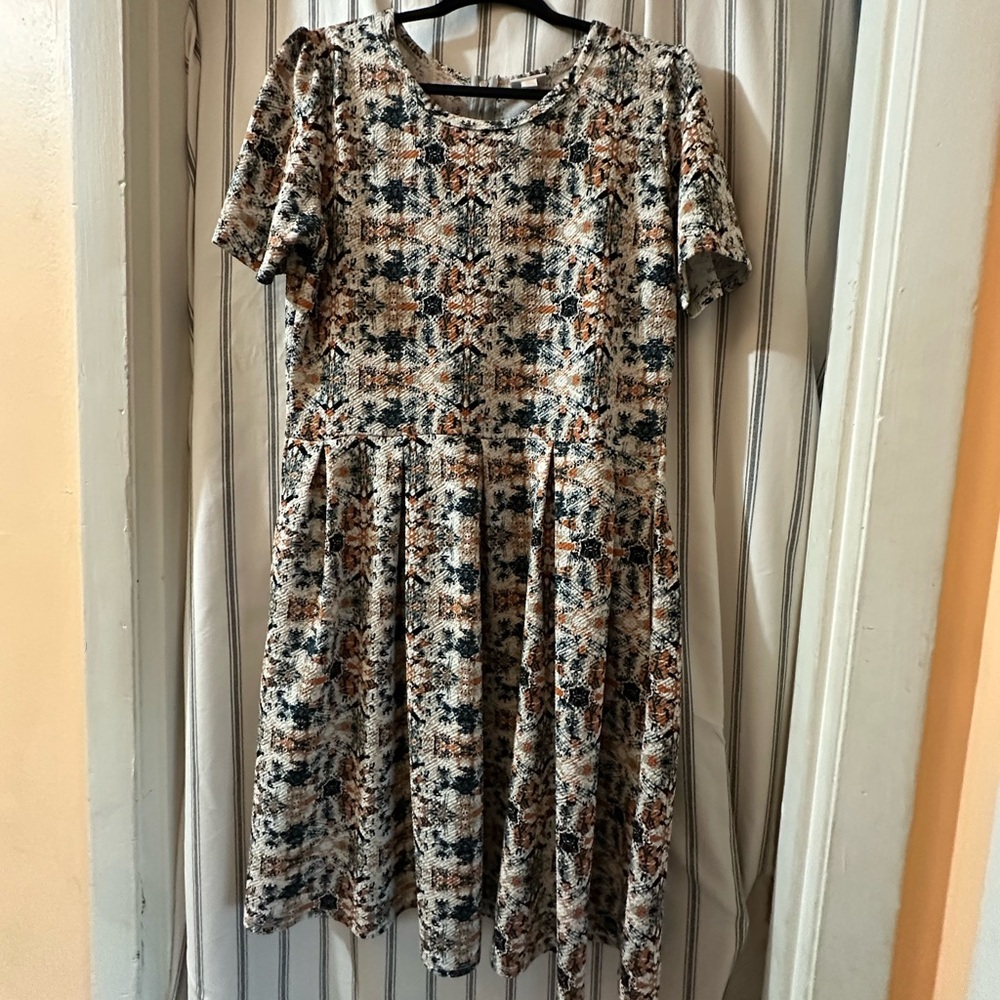 LuLaRoe Unicorn Snakeskin Patterned Midi Dress fits like an 18/20w